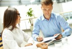 http://www.dreamstime.com/stock-photo-showing-results-young-businesswoman-looking-her-business-partner-explaining-document-image33381490