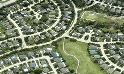 A suburban neighborhood map glows red