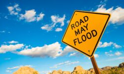 A traffic sign warns of flood