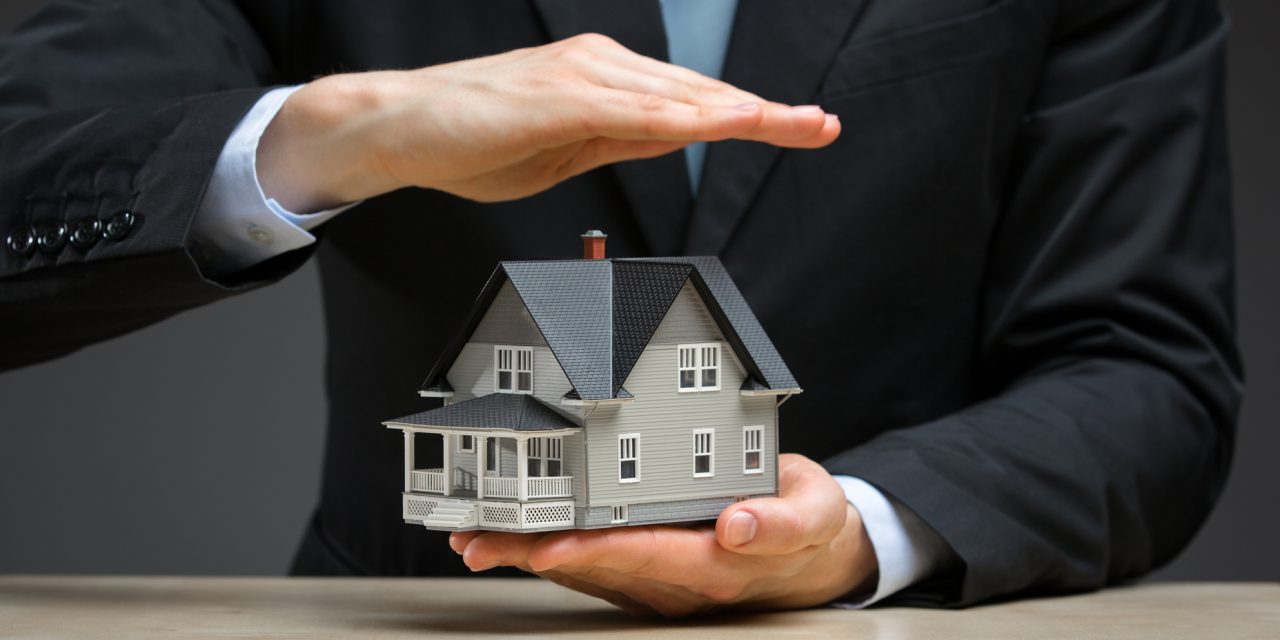 Can a mortgage holder foreclose on a property while processing a request for loan modification?