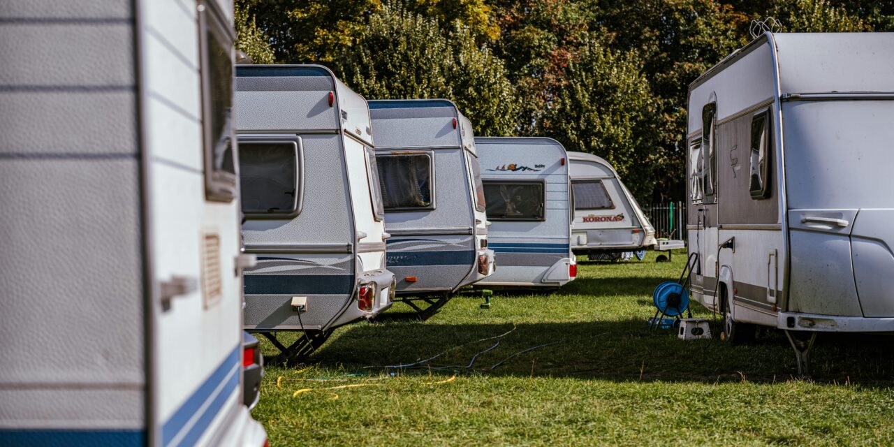 Mobilehome park management may not remove a vehicle from a driveway or designated parking space when the vehicle is used for work or employment